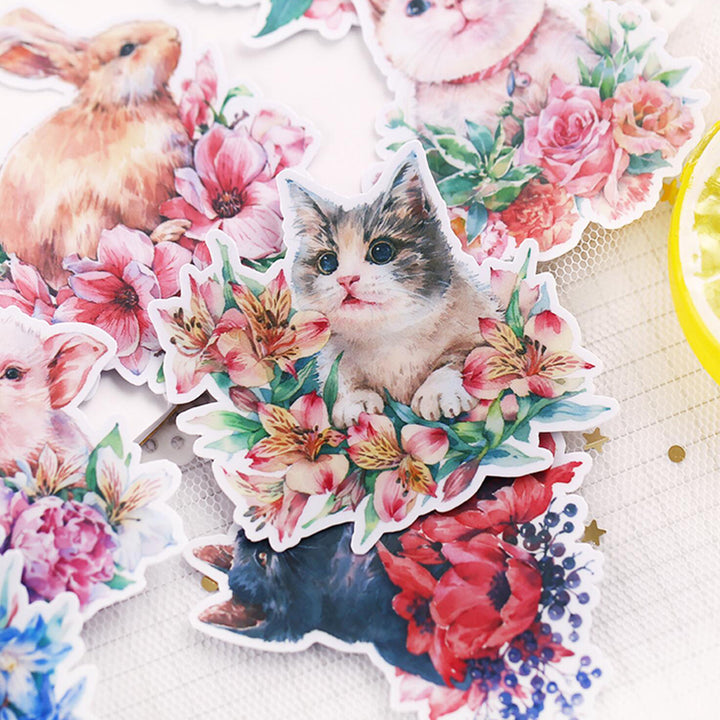 cat surrounded with flowers sticker